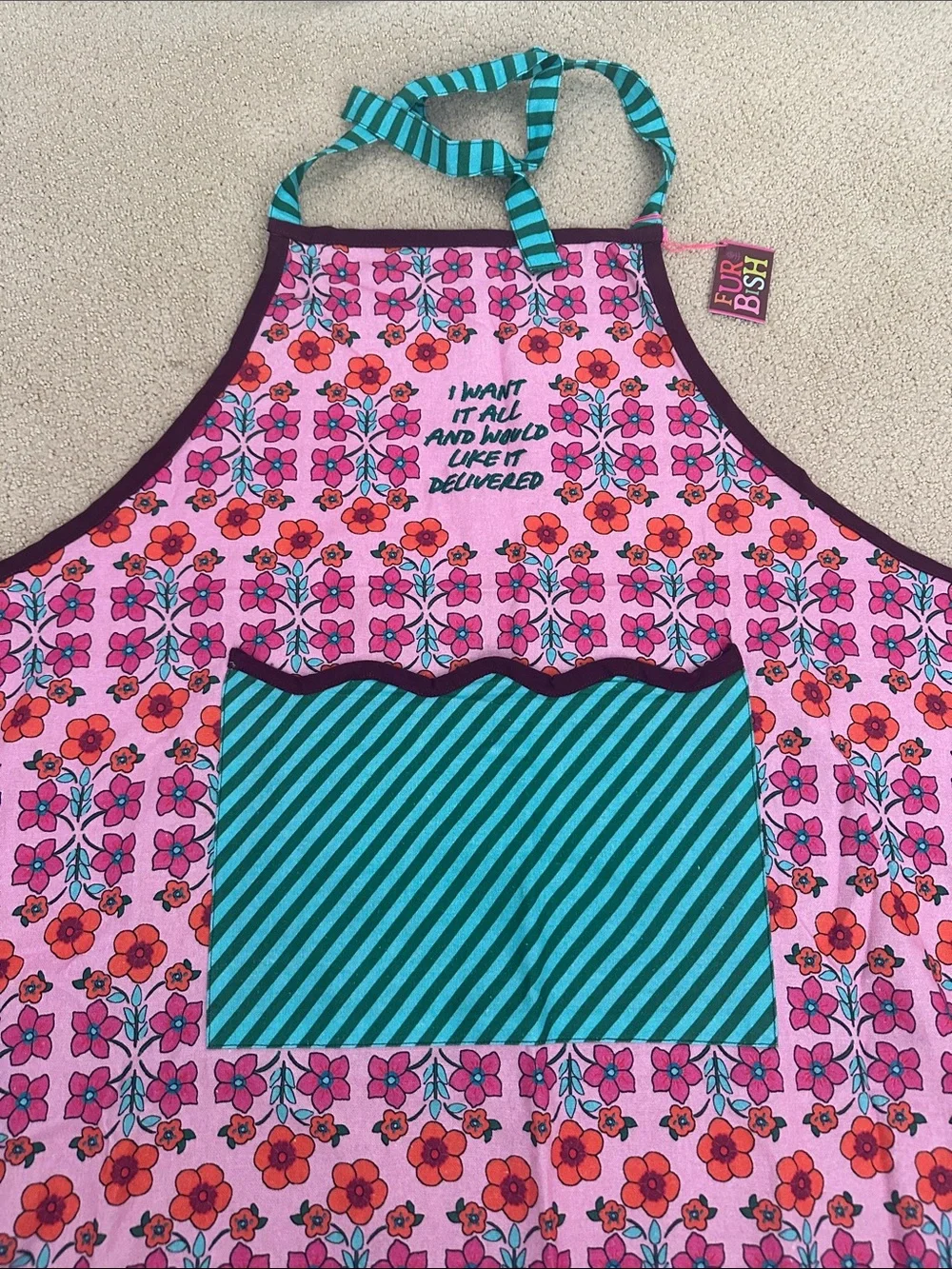 Whimsical Pink Floral Apron with Teal Striped Pocket